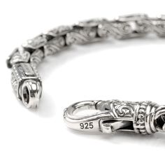 In 18th century Italy, no musician was as renowned as Niccolo Paganini. Created in carved sterling silver, Konstantino celebrates the virtuoso and creative passion of Paganini through this exceptional link bracelet. 8" long with lobster clasp to fit most wrists. Includes branded Konstantino gift packaging. Formal Engraved Link Bracelets, Luxury Sterling Silver Bracelets, Luxury Engraved Link Chain Bracelet, Luxury Bracelets With Lobster Clasp For Formal Occasions, Sterling Silver Formal Bracelet With Hook And Links, Luxury Engraved Oval Link Chain Bracelet, Luxury Engraved Oval Link Bracelet, Luxury Chain Bracelet With Intricate Design, Luxury Chain Bracelet With Hooks And Links