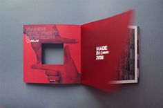 an open red book with the words training development and technology made in 2013 printed on it