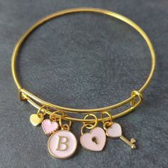 Gold Tone Fashion Bangle With Pink "B" Charm. A-Z Available Green Gemstone Bracelet, Infinity Necklace Silver, Open Bangle Bracelet, Gold Bracelet Set, Sterling Silver Bead Bracelet, Sterling Silver Charm Bracelet, Silver Bead Bracelet, Bangles Style, Hinged Bracelet