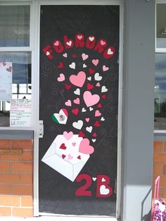 a door decorated with hearts and letters