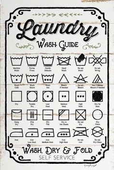 an old laundry wash guide is hanging on a wooden wall with black and white lettering