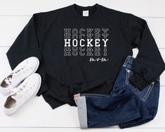 Hockey MOM STACKED  - Heavy Blend Crewneck Sweater Heavy blend crewneck sweaters which have a soft feel, It's very comfy and perfect for both men and women. Perfect For The Big Game!  Black is shown in main picture.  BRAND & MATERIAL: Heavy Blend Crewneck Sweatshirt - 8.0 oz., pre-shrunk 50/50 cotton/polyester - Heather Sport colors are 60/40 polyester/cotton - Reduced pilling and softer air-jet spun yarn - 1x1 athletic rib knit collar, cuffs and waistband, with spandex - Double-needle stitched cuffs and waistband - Safety Green is compliant with ANSI/ISEA 107 High Visibility standards - Tear Away Label  Any questions, please message us before placing your order and we would be more than glad to assist you! All products are made to order in our production warehouse in Long Beach, Californi Winter Team Spirit Crew Neck Sweater, Winter Crew Neck Sweater With Team Spirit Style, Black T-shirt For Winter Sports Events, Team Spirit T-shirt With Letter Print For Winter, Sports Season Crew Sweater With Letter Print, Winter Team Spirit Sweater With Letter Print, Sporty Winter Sweater With Lettering, Winter Team Spirit Sweatshirt With Letter Print, Winter Team Name Crew Neck Sweatshirt