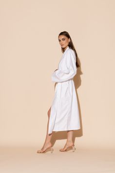 This luxurious Hotel single layer long robe in white is a must-have, whether lounging by the pool, relaxing at home, indulging in a spa day, or on vacation. The ultra-soft microfiber gives off ultra luxe vibes. Machine washable for ease of care. White Relaxed Fit Daywear Robe, Elegant White Lounging Robe, Elegant White Robe For Relaxation, Elegant White Beach Robe, White Summer Robe For Relaxation, Long White Robe For Daywear, White Long Robe For Daywear, White Spring Robe For Relaxation, Spring White Robe For Relaxation