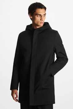 Our slim-fit parka coat is crafted from a cotton blend with a stand collar and enveloping hood. This lightly padded staple has a concealed zip and press-stud placket to keep in the warmth and discreet side-seam pockets.- Fully lined- ECONYL® is 100% regenerated nylon fibre from pre- and post-consumer waste such as fishing nets and other nylon waste 60% Cotton, 38% Recycled polyamide, 2% Elastane. Padding: 100% Polyester / Machine washBack length of size EU 48 is 49.5cm Hooded Down Parka For Fall, Hooded Cotton Puffer Jacket For Cold Weather, Hooded Down Outerwear With Double-lined Hood, Hooded Down Parka With Padded Collar, Parka With Detachable Hood For Cold Weather, Black Cotton Outerwear With Detachable Hood, Long Down Coat With Detachable Hood, Hooded Cotton Puffer Jacket With Padded Collar, Cotton Parka With Detachable Hood