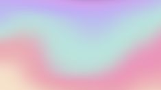 an abstract blurry background in pastel colors