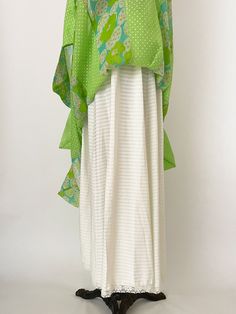 "60s lime green mod print maxi skirt with zig zag hem. Fully lined with sheer shell, alternating polka dot and floral panels and a stretchy elastic waistband. Condition: some spotting inside the lining around the waistband area with a couple small spots on the shell and minor seam-wear on the waistband -- please see photos. Overall great vintage condition. All measurements are taken with the garment laying flat and doubled for the bust, waist, and hips. Waist: 27\" - 30\" elastic waist Hips: 50\ Green Flowy Maxi Skirt For Spring, Flowy Green Maxi Skirt For Spring, Green Flowy Maxi Dress For Spring, Green Flowy Maxi Dress, Flowy Green Maxi Skirt, Mid Century Carpet, Mod Print, Print Maxi Skirt, Satin Kimono