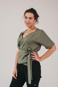 Women‘s linen wrap shirt with short sleeves and a belt resembles a kimono style crop top for the summer season.Qualities of this elegant oversized soft linen blouse:♥ 100 % European linen♥ Natural wrinkles♥ In the pictures, you can see the Mass green linen wrap shirt. Please choose any other color on the right.♥ Not ironed (and no need to iron to have a relaxed look).The fabric is certified 100% European linen. This guarantees that it meets human - ecological requirements. Linen is a natural, co Linen Tie Waist Top For Summer, Summer Linen Top With Tie Waist, Summer Linen Tops With Tie Waist, Cropped Linen Tops For Brunch, Casual Linen Wrap Top, Casual Linen Wrap Top For Summer, Cropped Linen Summer Blouse, Summer Cropped Linen Blouse, Relaxed Fit Summer Top With Tie Waist