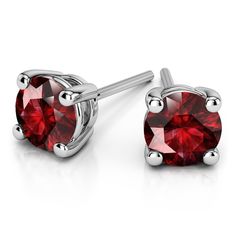 A beautiful pair of romantic platinum round cut ruby stud earrings. Each red gemstone measures 3.2 mm, with an approximate 1/3 carat total weight, and held in a platinum four-prong setting. Proudly made in the USA. Amethyst Earrings Studs, Diamond Earrings For Women, Ruby Earrings Studs, Amethyst Studs, Happy Mood, Dainty Studs, Solitaire Studs, Gemstone Stud Earrings, Red Gemstones