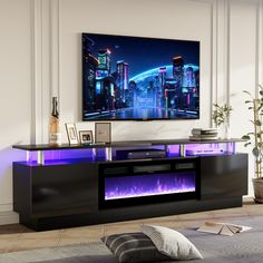 an entertainment center with a large television mounted on it's wall and purple lights