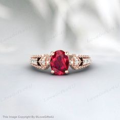 Vintage Sterling Silver Ruby Ring,Red Ruby Engagement Ring,Ruby Ring For Women,Oval Ruby July Birthstone Promise Ring,Anniversary Gift  Main Stone: Ruby  Main Stone Color: Red  Main Stone Shape: Oval  Birthstone Month: July  Secondary Stone: Simulated Diamond Secondary Stone Shape: Round Secondary Stone Color: White Jewelry Type: Ring  Metal: 925 Sterling Silver Method: Cast Personalisation: Possible Ring Size: We make rings from US 3 to US 16. (If you need smaller or bigger ring size, please as Engagement Ring Ruby, Birthstone Promise Rings, Rubin Ring, Silver Ruby Ring, Ring Ruby, Ruby Engagement Ring, White Jewelry, July Birthstone, Red Ruby