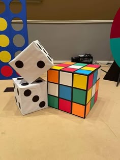 two rubik cubes are stacked on top of each other