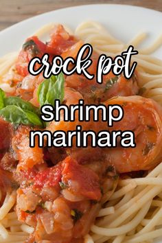 shrimp marinara with tomato sauce and basil on top