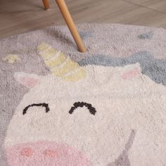 a rug with an image of a unicorn on it