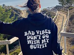 Bad Vibes Don't Go With My Outfit Hoodie Aesthetic Y2K Hoodie Oversized Preppy Hoodie Tumblr Hoodie Indie Clothing Y2K Sweater Trendy Hoodie 🖌️ DESIGN: Hand printed using DTG (Direct To Garment) method with certified pigment inks The entire process is eco-friendly; water based inks that are Okeo-Tex, Eco-Pass certified and CPSIA-compliant, bio-degradable and non-toxic (Innobella Textile Inks) - high durability and washability as the ink has scored 4.0 or higher on the AATCC wash test Knit in on Preppy Hoodie, Literary Shirts, Oversized Aesthetic, Positive Hoodie, Aesthetic Hoodies, Indie Clothing, Clothing Y2k, Artsy Aesthetic, Outfit Hoodie