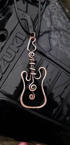 unisex necklace pendants necklace handmade design handmade wire wrap jewelry Wire Guitar, Guitar Earrings, Guitar Crafts, Wire Wrap Jewelry, Pendants Necklace, Music Jewelry, Necklace Pendants, Wrap Jewelry, Unisex Necklace