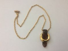 "Trifari pendant, brown plastic, gold plated metal. 1960-s Chain - 19\", magnetic clasp, chain not original. pendant size - 1 3/4\" x 1 1/16\" Very good to excellent vintage condition" Vintage Brown Jewelry With Chain, Brown Bakelite Jewelry As A Gift, Brown Bakelite Jewelry Gift, Pendant With Chain, Oct 30, Magnetic Clasp, Pendant Necklaces, Gold Plate, Gold Necklace