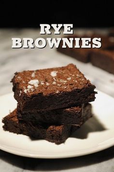 two brownies on a plate with the words rye brownies in front of them