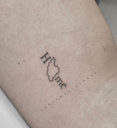 a person with a tattoo on their leg that says h e m f n d