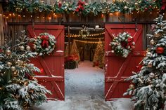 an open barn door decorated with christmas wreaths and lights