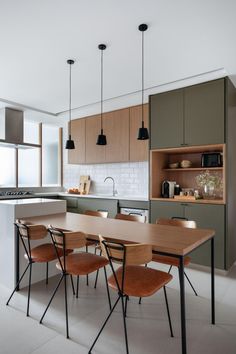 the kitchen is clean and ready to be used as a dining room or office space