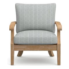 a wooden chair with blue and white striped upholstered fabric on the armrests