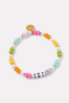 A wearable reminder of words to live by, this beaded bracelet by Little Words Project is handcrafted with “Joy” lettering, multi-color beads, and stretch elastic for easy on-and-off. Alone or stacked, it makes the perfect gift for yourself or a friend. Little Words Project encourages you to wear your word to lift you up, and then pass it on to someone who needs it more. Each bracelet comes with a unique ID tag. Use this code to register your bracelet on the Little Words Project website to join the community and track your bracelet’s journey from person to person. Word Bracelet Beads Ideas, Little Words Project Bracelets, Letter Bracelet Beads, Joy Lettering, Joy Letters, Beaded Name Bracelet, Project Website, Little Words Project, Friendship Bracelets With Beads