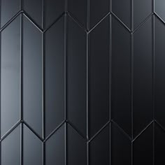 an abstract black wallpaper pattern with vertical lines and diagonals in the center, on top of each other