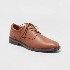 From formal meetings and events to family functions, these Leo Oxford Dress Shoes from Goodfellow & Co™ are a great pick to complete your ensemble. These medium-width shoes feature a cushioned footbed for comfy wear, making them great for both special occasion and everyday wear. With a sleek upper with stitched detailing and a lace-up front, they're perfect for creating a sharp, stylish look. Goodfellow & Co™: Where style & fit are always in good company. Black Dress Shoe, Brown Oxford Shoes, Dress Up Shoes, Comfortable Dress Shoes, Oxford Shoes Style, Chukka Sneakers, Brown Dress Shoes, Comfy Wear, Black Dress Shoes