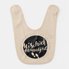 a bib that says, i'm married and has a black circle on it