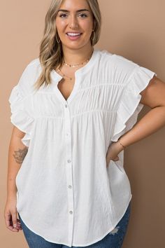 V-neck woven button down ruffle sleeve top 55% Rayon, 45% Polyester Model is 5' 9", wearing a size 1X This item is a part of our Curvy Collection V-neck Tops With Ruffle Hem For Daywear, Summer V-neck Top With Ruffle Hem, Feminine V-neck Top With Gathered Sleeves, Feminine Cotton V-neck Puff Sleeve Top, V-neck Rayon Top With Ruffles, Ruffle Sleeve Top, Ruffled Sleeve Top, Woven Top, Button Downs