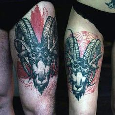 two tattoos on the legs of men with goats