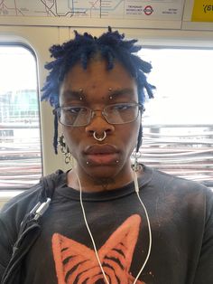 Punk Makeup Looks Men, Masc Alt Makeup, Blue Afro Hair, Poc Hairstyles, Masculine Makeup, Blue Afro, Apocalypse Costume, Spikey Hair, Bleached Eyebrows