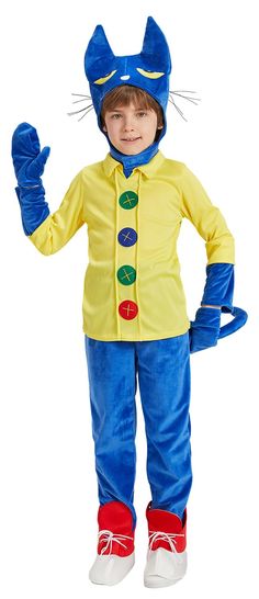 a little boy in a costume that is wearing a blue and yellow cat suit with red shoes