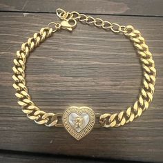 Gold Stainless Steel Heart Shaped Madusa Bracelet Accented With Pearl White Metal Heart Bracelet, White Metal Heart-shaped Bracelet, Pearl Bracelet Stack, Sequin Bracelet, Boho Charm Bracelet, Coach Earrings, Alex And Ani Bangles, Simple Bangle, Wood Bracelet