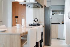 the kitchen is clean and ready to be used as a dining room or living area