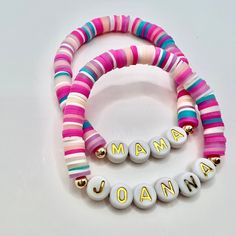 "This mommy and me bracelet set is the perfect back to school comfort gift. Each bracelet can be personalized with any word or name of your choice up to 10 letters. Over 50+ heishi bead options and choice of letter beads. Gold accent beads can be switched out for silver, just request in personalization box at checkout. If Products Details: - This listing is for ONE set of 6mm Heishi bracelets with gold or silver plated accents. - If size is not entered at checkout bracelet will come in standard Adjustable Letter Beads Jewelry For Crafting, Personalized Pink Bracelets For Crafting, Birthday Bracelets With Round Heishi Beads, Heishi Beads Bracelets For Birthday, Birthday Bracelet With Heishi Beads, Pink Jewelry With Colorful Beads For Personalized Gift, Personalized Pink Beaded Bracelets For Crafting, Adjustable Heishi Beads Bracelet For Birthday, Adjustable Heishi Beaded Bracelets For Birthday