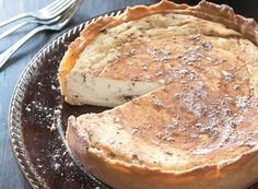 a pie sitting on top of a metal pan