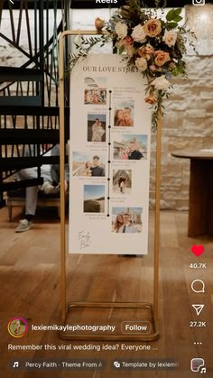 a sign that is sitting on top of a stand with flowers and photos attached to it