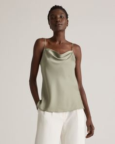 The neckline on this cami deserves a chef’s kiss. Softly draped to highlight your shape, it’s the ideal layer under a cardigan or blazer, or wear it on its own—a top this good deserves the spotlight. Adjustable straps ensure the right fit, and side slits let it sit perfectly on your hips. Made of our bestselling premium mulberry silk with a hint of stretch, famously low-maintenance and washable. Plus, silk fiber contains 18 kinds of amino acids that make it amazing for skin nourishment, hypo-all Elegant Cami Blouse For Summer, Chic Fitted Camisole For Spring, Elegant Spring Viscose Camisole, Fitted Tops With Spaghetti Straps For Fall, Versatile Fitted Spaghetti Strap Tops, Classic Fitted Camisole Top, Elegant Fitted Tank Top For Summer, Chic Cami Tops For Workwear, Chic Cami Tops For Work