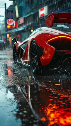 a red sports car driving down a rain soaked street