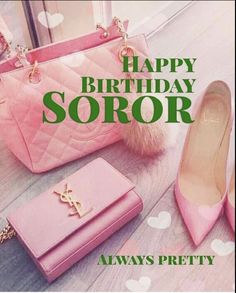 a pink handbag and purse sitting on top of a table next to a pair of shoes