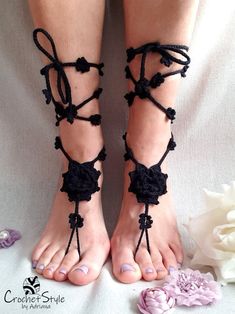 BLACK FLORAL BAREFOOT SANDALS Hand croched, black barefoot sandals with big flower on foot and very decorative flower strings to tie on the leg. Very elegant, eye catching pattern. Made of 100% thickner cotton, stitched with precision in every detail. They are ideal for summer on the beach, yoga as a beautiful decoration on feet. One size fits all. Fabric and care: - 100% classic cotton - hand wash - shape and dry flat to hold the shape - after drying can olso steam flowers on string with an iro Beach Sandals With Crochet And Round Toe, Beach Crochet Sandals With Round Toe, Crochet Sandals With Round Toe For Beach, Crochet Round Toe Sandals For Beach, Summer Crochet Sandals For The Beach, Crochet Open Toe Sandals For Spring, Adjustable Crochet Open Toe Sandals, Adjustable Crochet Open-toe Sandals, Spring Crochet Open Toe Sandals