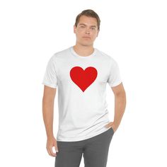 A simple minimalist messgae in one solitary heart. You have tons of love to give. Show your love to that special someone. XS S M L XL 2XL 3XL Width, in 16.50 17.99 20.00 22.01 24.02 25.98 27.99 Length, in 27.01 27.99 29.02 30.00 31.02 32.01 32.99 Sleeve length, in 8.62 8.90 9.17 9.45 9.72 10.00 10.39 Red T-shirt With Heart Graphic As Gift, Red Heart Graphic T-shirt As Gift, Red Heart-shaped T-shirt With Heart Graphic, Casual Red Heart-shaped T-shirt, Red Heart Graphic Top As A Gift, Heart-shaped Tops For Valentine's Day, Heart-shaped Tops For Valentine's Day Gift, Valentine's Day Gift T-shirt With Heart Graphic, Valentine’s Day Gift T-shirt With Heart Graphic