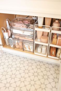 the inside of a bathroom cabinet filled with beauty products