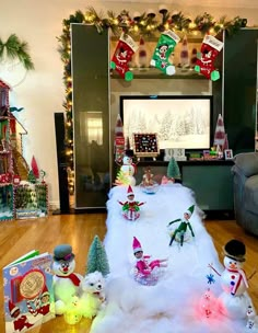 a living room filled with lots of christmas decorations