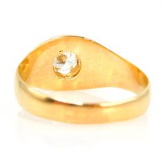 A nearly half carat round diamond is held in place with six gold prongs in this oversize Belcher style ring. Perfect for unisex wear, the Belcher style setting is a classic, elegant design named after its creator, Thomas Belcher. The top measures 10 mm in width, the shoulders 7.84 mm, and the band tapers to 3.46 mm at its narrowest point (the bottom). Metal: 14K Yellow Gold Main Stone: 1 Round Brilliant Diamond (approx. 0.43ct, H color, SI2 clarity, 5.0 x 2.79mm) Ring Size: 10.0 (can be sized) Gold Price, Classic Elegant, Brilliant Diamond, Suede Shoes, Round Brilliant, Round Diamond, The Band, Round Diamonds, Elegant Design