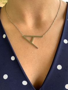 "Large Initial Necklace, Big Letter Necklace, Sideways Initial Necklace, Oversized Initial Necklace, Alphabet Necklace, Stainless Steel, Stainless Steel Initial Letter Necklace Gold Plated This beautiful Stainless Steel necklace can be worn on its own or as a layering piece. It will add statement to your outfit. It comes available in gold and silver color. It does not fade or tarnish. Excellent quality*. ♦ Materials: Stainless Steel ♦ Available colors: Gold and Silver ♦ Necklace measurements: 14 Unbiological Sister Necklace, Gold And Silver Necklace, Delicate Layered Necklace, Letter Necklace Gold, Silver Heart Jewelry, Poppy Necklace, Initial Letter Necklace, Necklace Measurements, Big Letter