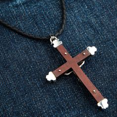 Jesus Crucifix Cross Wood 925 Sterling Silver Pendant ~New  Approximate pendant size: 1 7/8” x 2 7/8” inches  Approximate pendant weight: 14 Grams   Material: 100% Solid Sterling Silver  Nicely polished before packaged  Brown wood cross   Stand out from the crowd by having a natural wood pendant. This pendant depicts the lord and saviour, Jesus nailed to the wooden cross. Jesus, in this instance, is made from 100% solid sterling silver. Since it is made from sterling silver, it means that it wil Wooden Cross, Wood Crosses, Wood Pendant, Brown Wood, Sterling Silver Pendants, Natural Wood, Silver Pendant, Jesus, 925 Sterling Silver