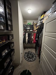 the closet is full of clothes and other items