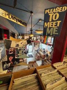 the inside of a music store with lots of records